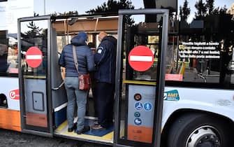 Italian Police and staf of AMT check the QR code confirming that people received the Covid-19 vaccine, at Brignole bus stop in Genoa, Italy, 06 December 2021. The measures on the 'enhanced' green certificate (obtainable only with vaccination or recovery) come into effect from 06 December 2021 until 15 January 2022
ANSA/LUCA ZENNARO