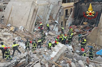 A handout picture provided by the Vigili del Fuoco shows an aerial view after blast caused by a gas leaklater in Ravanusa, Sicily, Italy, 12 December 2021. Firefighters found a fourth body in the rubble of the collapsed buildings in Ravanusa. It could be a woman. Previously, the bodies of two women and a man were recovered; two survivors rescued, five people are still missing. ANSA/VIGILI DEL FUOCO HANDOUT HANDOUT EDITORIAL USE ONLY/NO SALES