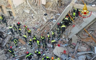 epa09637933 A handout picture provided by the Vigili del Fuoco shows an aerial view of the damage following a blast caused by a gas leak in Ravanusa, Sicily, Italy, 12 December 2021. Firefighters found a fourth body in the rubble of the collapsed buildings; two survivors were rescued, five people are still missing.  EPA/VIGILI DEL FUOCO HANDOUT  HANDOUT EDITORIAL USE ONLY/NO SALES