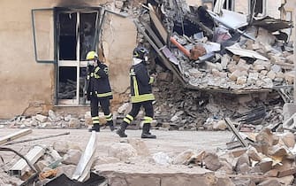 Rescue teams at the scene of a blast caused by a gas leak in Ravanusa, Sicily, Italy, 12 December 2021. Firefighters found a fourth body in the rubble of the collapsed buildings in Ravanusa. It could be a woman. Previously, the bodies of two women and a man were recovered; two survivors rescued, five people are still missing.ANSA/ Matteo Guidelli
