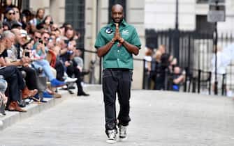 PARIS, FRANCE - JUNE 20: Virgil Abloh greets the crowd during the Louis Vuitton Menswear Spring Summer 2020 show as part of Paris Fashion Week on June 20, 2019 in Paris, France. (Photo by Dominique Charriau/WireImage)