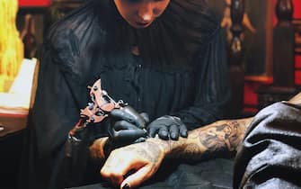 Kat von D has posted a photo on Instagram with the following remarks:
Been cleaning up all of @prayers old tattoos... some of them were in dire need of a makeover... thank you, babe, for letting me tattoo the hell out of you!