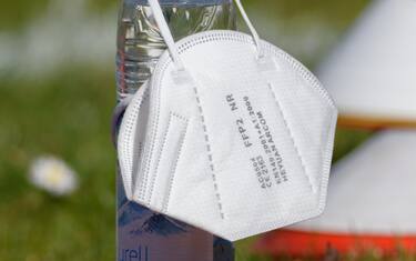 Aschheim, Germany, Mar 31th 2021 FFP2 mask hanging on a water bottle before the 2. Frauen Bundesliga match between FC Bayern Munich II and 1. FFC Niederkirchen at Sportpark Aschheim, Germany. Sven Beyrich/SPP (Photo by Sven Beyrich/SPP/Sipa USA)