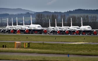 GLASGOW, SCOTLAND - MARCH 21: A grounded fleet of British Airway planes sit on the runway at Glasgow Airport on March 21, 2020 in Glasgow, Scotland. Coronavirus (COVID-19) has spread to at least 186 countries, claiming nearly 12,000 lives and infecting more than 286,000 people. There have now been 3,983 diagnosed cases in the UK and 177 deaths. (Photo by Jeff J Mitchell/Getty Images)