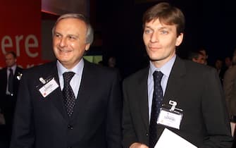 20031227-PARMA-CRO:PARMALAT: CALISTO E STEFANO TANZI.Calisto (s) e Stefano Tanzi in una foto d'archivio scattata il 16 marzo 2001 alle assise generali di Confindustria a Parma.
                            GIORGIO BENVENUTI/ANSA
