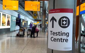A sign directs passengers to a testing centre in Terminal 5 at Heathrow Airport in west London ahead of international travel restarting on Monday May 17, following the further easing of lockdown restrictions. Picture date: Thursday May 13, 2021.