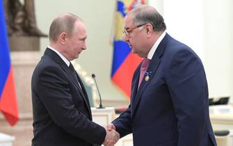 January 26, 2017 - Moscow, Russia - January 26, 2017. - Russia, Moscow. - Russian President Vladimir Putin awards Alisher Usmanov, founder of USM Holdings (right) with the decoration for Beneficence. (Credit Image: Â© Russian Look via ZUMA Wire)