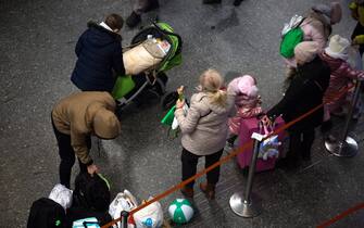 Refugees from Ukraine come to the Polish capital every day. Some want to stay in Poland and others plan to go to Western Europe. Refugees wait at temporary accommodation points before they leave. In this photo Refugees at Warsaw Expo Center. Refugees from Ukraine, Poland - 08 Mar