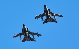 ALBACETE, CASTILLA-LA MANCHA, SPAIN - FEBRUARY 22: Two Panavia Tornado Aeronautica Militare aircraft from Italy perform combat air maneuvers in the vicinity of the Los Llanos air base on February 22, 2022, in Albacete, Castilla-La Mancha, Spain. The maneuvers are conducted during one of the NATO Tactical Leadership Program (TLP) courses, better known as NATO Pilot School. Currently, the TLP organization is made up of ten NATO countries: Belgium, Denmark, France, Germany, Greece, Holland, England, Italy, Spain and the United States, although other nations also participate by contracting their assistance. The pilots take advantage of these practices to prepare themselves for a possible war in Ukraine. (Photo By A. Perez Meca/Europa Press via Getty Images)