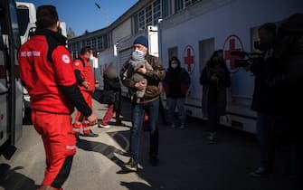 ROME, ITALY - MARCH 22: Ukrainian refugees evacuated from Lviv by Italian Red Cross arrive to Rome, on March 22, 2022 in Rome, Italy. About 80 frail people including children, elderly and disabled were evacuated from Lutsk,  Kharhiv and Kiev by the Italian Red Cross in collaboration with the Civil Protection Department. (Photo by Antonio Masiello/Getty Images)