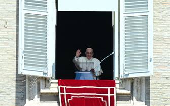 Pope Francis waves to the crowd during his Regina Coeli prayer from the window of the apostolic palace overlooking St. Peter's Square on April 24, 2022 at the Vatican. (Photo by VINCENZO PINTO / AFP) (Photo by VINCENZO PINTO/AFP via Getty Images)