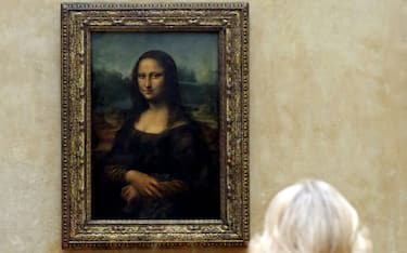 The Duchess of Cornwall views Leonardo Da Vinci's Mona Lisa during a visit to the Louvre Museum in Paris, France.