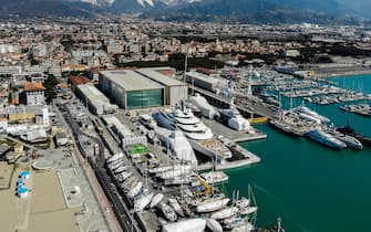 A general view shows the multi-million-dollar mega yacht Scheherazade (C), docked at the Tuscan port of Marina di Carrara, Tuscany, on March 22, 2022. - The ownership of the multi-million-dollar mega yacht Scheherazade, docked on the Tuscan coast, is currently the source of speculation that it belongs to a Russian oligarch, or even perhaps President Vladimir Putin himself. Ukrainian President Volodymyr Zelensky urged Italian lawmakers on March 22 to stop their country being a playground for Russia's elite, while warning food shortages sparked by the war risk a fresh migrant crisis. (Photo by Federico SCOPPA / AFP) (Photo by FEDERICO SCOPPA/AFP via Getty Images)