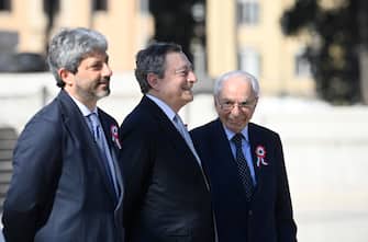 Italian President of the Chamber of Deputies Roberto Fico  (L),  Prime Minister Mario Draghi (C), and Giuliano Amato, jurist and politician (R)  attendto lay a wreath of flowers at the Altar of the Fatherland during the celebrations of Republic Day, in Rome, Italy, 02 June 2022. The anniversary marks the proclamation of the Italian Republic in 1946. 
ANSA/RICCARDO ANTIMIANI