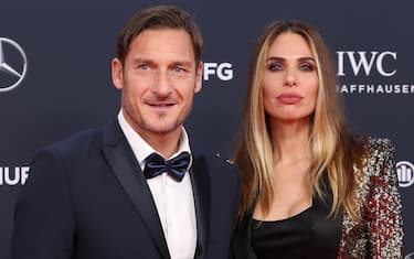 epa06569288 Former Italian soccer player Francesco Totti (L) and his wife Ilary Blasi (R) arrive at the 2018 Laureus World Sports Awards in Monaco, 27 February 2018. The annual Laureus Awards are held to honor people whom make a notable impact and remarkable accomplishments in the world of sport throughout the year.  EPA/SEBASTIEN NOGIER