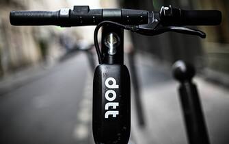This picture taken on June 12, 2019 shows an electric scooters of the transportation company 'Dott' parked in a street of Paris. (Photo by Philippe LOPEZ / AFP) (Photo by PHILIPPE LOPEZ/AFP via Getty Images)