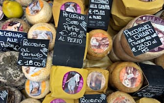 VOLTERRA, ITALY - July 24: Pecorino sheep's milk cheeses on sale in a delicatessen on July 24, 2015 in Volterra in the region of Tuscany, Italy. Tuscany is renowned for its landscapes, history, cuisine and artistic legacy. It is also the home of Sangiovese, the primary grape used in the three Tuscan DOCG Denominazione di Origine Controllata e Garantita (Denomination of Controlled and Guaranteed Origin) wines Chianti, Vino Nobile di Montepulciano and Brunello di Montalcino. (Photo by David Silverman/Getty Images)