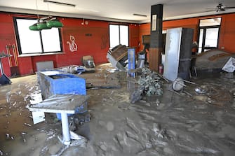 Aftermath of flash floods caused by an overnight rain bomb, in Pianello di Ostra, Ancona province, central Italy, 16 September 2022. At least 10 people died following flash floods due to rain bombs and heavy winds in the province of Ancona.
ANSA/ALESSANDRO DI MEO