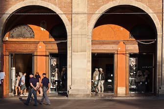 Carabinieri police passing shopping arcades in Piazza Maggiore in Bologna. (Photo by: Loop Images/Universal Images Group via Getty Images)