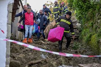 Rescuers during during the operations following the deadly landslide, in Casamicciola, Ischia island, Italy, 28 November 2022. Italy has declared state of emergency following a landslide on Ischia Island which until now has left eight people dead and four missing. A newborn baby and two children are among the confirmed victims of the disaster. Four other people are injured and 230 are homeless after a massive avalanche of mud and debris hit the town of Casamicciola Terme following intense rain. ANSA/ CIRO FUSCO