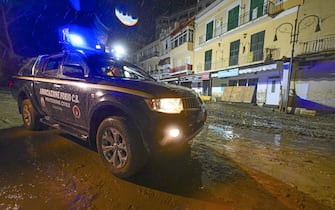 Civil Protection cars of the Campania Region cross the streets of the red zone of Casamicciola inviting residents to leave their homes due to the announced orange alert, Ischia island, Italy, 09 December 2022. There was a fresh evacuation from Ischia's red zone Friday amid an orange weather alert after storms caused a landslide that claimed 12 lives on the Gulf of Naples island last month. Emergency commissioner for the affected town of Casamicciola, Simona Calcaterra, said that this time the order to leave homes is "more decisive and pressing", and is not optional. She was speaking amid reports that several people are unwilling to leave their homes despite the alert. ANSA / CIRO FUSCO