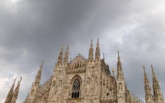Milan, Italy - july 28 2021 - Duomo Cathedral Milan Italy cloudy sky