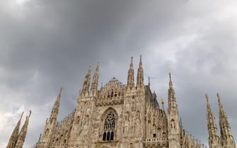 Milan, Italy - july 28 2021 - Duomo Cathedral Milan Italy cloudy sky