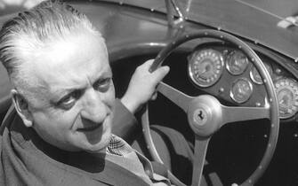 UNKNOWN — Early-1950s:  Enzo Ferrari began racing as a youngster in the mid-1910s.  After World War I, he started Scuderia Ferrari, the racing team representing the Alfa Romeo brand.  He continued as a driver through 1932 before turning his full attention to managing Alfa Romeo’s racing operation.  After World War II, in 1947, Ferrari began manufacturing cars bearing his name.  He used racing extensively to help with marketing his cars, winning the prestigious 24 Hours of Le Mans at Circuit de la Sarthe in France, to date, 14 times.  Since 1950, Ferraris have won the World Formula One championship 15 times with drivers Alberto Ascari, Juan Manuel Fangio, Mike Hawthorn, Phil Hill, John Surtees, Niki Lauda, Jody Scheckter, Michael Schumacher and Kimi Raikkonen.  (Photo by ISC Images & Archives via Getty Images)