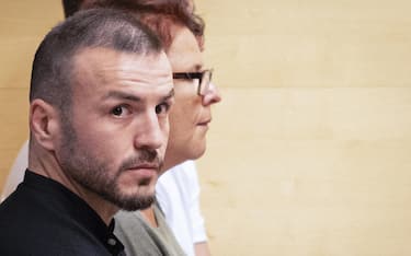 epa09990023 The defendant Rassoul Bissoultanov (L), of Chechen origin, living in France, attend a trial by the popular jury accused of beating to death Niccolo Ciatti, a 22 years-old Italian man, on a nightclub in Lloret de Mar in 2017, at the Court of Girona, Catalonia, Spain, 01 June 2022.  EPA/DAVID BORAT