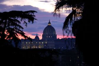 A view of St. Peter's Basilica at dusk from Pincio terrace in Rome, Italy, on Monday, Jan. 30, 2023. The Bank of Italy lifted this years economic-growth prediction to 0.6%  a sign the country is managing to weather higher energy costs and interest rates. Photographer: Alessia Pierdomenico/Bloomberg via Getty Images