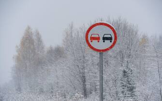 No overtaking sign on the winter road
