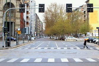 A view of deserted streets in Milan, Italy, during the country's lockdown following the COVID-19 new coronavirus pandemic, 29 March 2020. Italy is under lockdown in an attempt to stop the widespread of the SARS-CoV-2 coronavirus causing the Covid-19 disease. 
ANSA/ PAOLO SALMOIRAGO