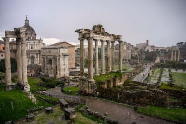 ROME, ITALY - MARCH 27: A general view of the ancient Roman Forum ruins and the Colosseum during a hailstorm, on March 27, 2023 in Rome, Italy. (Photo by Antonio Masiello/Getty Images)