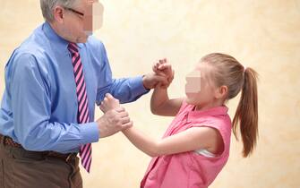 Pupil fighting with teacher