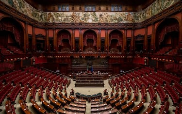 ROME, ITALY - OCTOBER 16: A general view of the empty hall (Aula) of Palazzo Montecitorio seat of the Italian Chamber of Deputies, on October 16, 2020 in Rome, Italy. The historical building originally designed in 1623 was inaugurated as the Chamber of Deputies in 1871. Following the September 2020 referendum, Italy's parliament voted to cut the number of representatives in both MP and Senate houses by more than a third. The vote was spearheaded by Italy's Five Star Movement, justifying the move would reduce costs. (Photo by Antonio Masiello/Getty Images)
