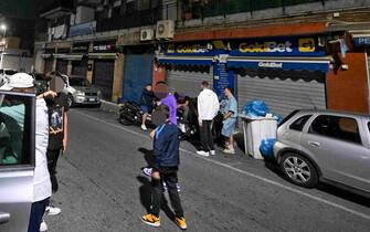 People on the street in the area of ??via Pisciarelli, the epicenter of the earthquake, on the border between the municipality of Pozzuoli and Agnano, a hamlet of Naples, Italy, 03 October 2023. A 4.0-magnitude earthquake late on Monday at the Campi Flegrei (Phlegraean Fields) has heightened concern among people living in the volcanic area near Naples about a recent wave of seismic activity.ANSA/CIRO FUSCO