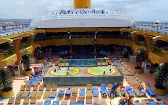 epa03061151 A photo dated 11 April 2005 and made available on 15 January 2012 shows a general view of a sun and pool deck aboard the Italian cruise ship 'Costa Concordia'. The search for survivors continued on 15 January 2012 as the confirmed number of deaths in the sinking of the cruise liner 'Costa Concordia' rose to five on 15 January with the discovery of two more bodies in the flooded stern of the cruise ship that sank off the coast of the Giglio Island, Italy, after hitting an underwater rock on 13 January night.  EPA/DAPHNE TESEI