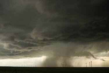 ELBERT COUNTY, CO - MAY 8: A supercell thunderstorm produces a downburst, May 8, 2017 in Elbert County near Limon, Colorado. With funding from the National Science Foundation and other government grants, scientists and meteorologists from the Center for Severe Weather Research try to get close to supercell storms and tornadoes trying to better understand tornado structure and strength, how low-level winds affect and damage buildings, and to learn more about tornado formation and prediction. (Photo by Drew Angerer/Getty Images)