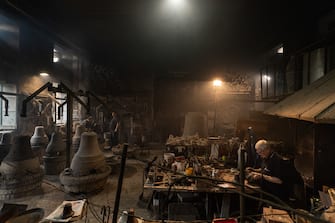 Agnone, Molise - General view of the Marinelli Pontificial foundry in Agnone, a small town in Molise region. On the right the bell master Antonio Delli Quadri.

Ad Agnone, la tradizione di forgiare e fondere i metalli rislae a 2500 anni fa, al Medioevo. La fonderia Marinelli, con oltre otto secoli di attività, è l’officina in cui vengno prodotte camoane più antica del mondo. Ad oggi i Marinelli continuano questa secolare tradizione forgiando campane dai bellissimi rilievi artistici e dalla perfetta sonorità. Nel 1924, Papa Pio XI, concesse alla famiglia Marinelli di effiggiarsi dello stemma Pontificio.
Ph. Roberto Salomone