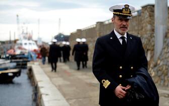 Italian Captain Gregorio De Falco stands in the port of the Italian island of Giglio on January 13, 2013 during commemorations marking the first anniversary of the Costa Concordia cruise ship disaster. Survivors, grieving relatives and locals on the island of Giglio gathered on January 13 to mark the first anniversary of the Costa Concordia cruise ship disaster, which claimed 32 victims. AFP PHOTO / FILIPPO MONTEFORTE        (Photo credit should read FILIPPO MONTEFORTE/AFP via Getty Images)