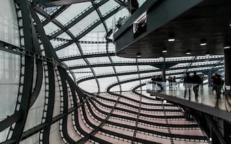 NO FRANCE - NO SWITZERLAND: December 9, 2017 : People visiting the 1850-seat auditorium, located inside the La Nuvola which in turn is inside the Teca. The steel and glass structure was ideated and designed by the architect Massimiliano Fuksas from  Rome.