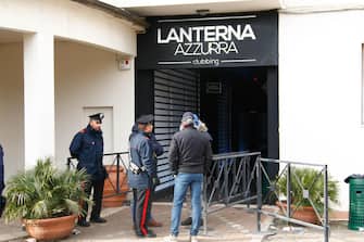 Carabinieri officers stand in front of the disco 'Lanterna Azzurra' in Corinaldo, central Italy, central Italy, 08 December 2018. At least Six people, all but one of them minors, were killed and about 35 others injured in a stampede of panicked concertgoers early Saturday at a disco in a small town on Italy's central Adriatic coast.
ANSA/PASQUALE BOVE