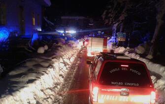 An picture of firefighters' column vehicles during the night journey to the hotel Rigopiano, Abruzzo region, overwhelmed yesterday by a snow's avalanche, sent by rescuers arrived at the scene. Farindola (Pescara), Jan. 19, 2017. According to the Abruzzo mountain rescue there would be many deaths. ANSA/ Italian firefighters press office +++ ANSA PROVIDES ACCESS TO THIS HANDOUT PHOTO TO BE USED SOLELY TO ILLUSTRATE NEWS REPORTING OR COMMENTARY ON THE FACTS OR EVENTS DEPICTED IN THIS IMAGE; NO ARCHIVING; NO LICENSING +++