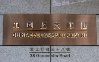 epa09469325 Signage for China Evergrande Centre is displayed at the building's entrance in Hong Kong, China, 15 September 2021. Chinese property developer Evergrande said on 14 September that its property sales will likely continue to drop significantly in September, resulting in a further deterioration of its cash situation, according to media reports.  EPA/JEROME FAVRE