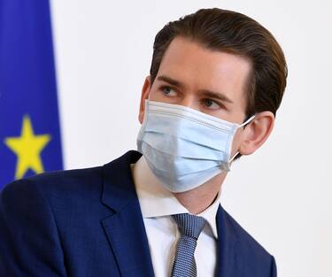 Austrian Chancellor Sebastian Kurz wears a face mask during a press conference on the actual situation amid the new coronavirus COVID-19 pandemic, on April 21, 2020 in Vienna. (Photo by HELMUT FOHRINGER / APA / AFP) / Austria OUT (Photo by HELMUT FOHRINGER/APA/AFP via Getty Images)