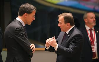 Netherlands' Prime Minister Mark Rutte (L) speaks to Sweden's Prime Minister Stefan Lofven prior a round table on December 14, 2018 in Brussels during the second day of a European Summit aimed at discussing the Brexit deal, the long-term budget and the single market. - EU leaders will approve a modest list of euro single currency reforms on December 14 that are a far cry from the vast overhaul to the European project sought by France. (Photo by LUDOVIC MARIN / AFP)        (Photo credit should read LUDOVIC MARIN/AFP via Getty Images)