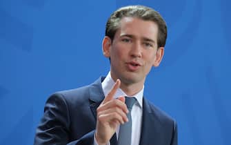 BERLIN, GERMANY - FEBRUARY 03: Austrian Chancellor Sebastian Kurz speaks to the media with German Chancellor Angela Merkel (not pictured) following talks at the Chancellery on February 03, 2020 in Berlin, Germany. Kurz is on a two-day official visit to Berlin. (Photo by Sean Gallup/Getty Images)