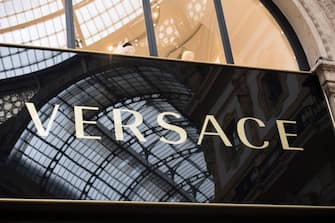 A picture shows the logo of Italian fashion shop Versace in the Vittorio Emanuele II luxury Gallery in the center of Milan on May 3, 2019. (Photo by Miguel MEDINA / AFP)        (Photo credit should read MIGUEL MEDINA/AFP via Getty Images)