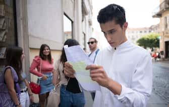 1256669398 TURIN, ITALY - JULY 16: A boy tries out a script to be played during the casting tests during of Casting of the new film "Viaggio a sorpresa" directed by Ronn Moss on July 16, 2020 in Turin, Italy. Casting of the new film "Viaggio a sorpresa" directed by Ronn Moss (ex Ridge of "Beautiful" tv soap) which will be shot from September in Puglia. (Photo by Stefano Guidi/Getty Images)