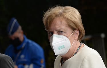 Germany's Chancellor Angela Merkel departs from a meeting at the EU summit, amid the coronavirus pandemic (COVID-19) in Brussels, Belgium on July 20, 2020. - Leaders from 27 European Union nations met throughout the night of July 19 to assess an overall budget and recovery package spread over seven years estimated at some 1.75 trillion to 1.85 trillion euros. The summit will continue into it's fourth day on Monday. (Photo by JOHANNA GERON / POOL / AFP) (Photo by JOHANNA GERON/POOL/AFP via Getty Images)